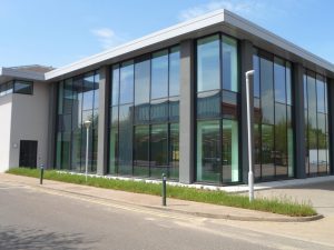Powder coated curtain walling.